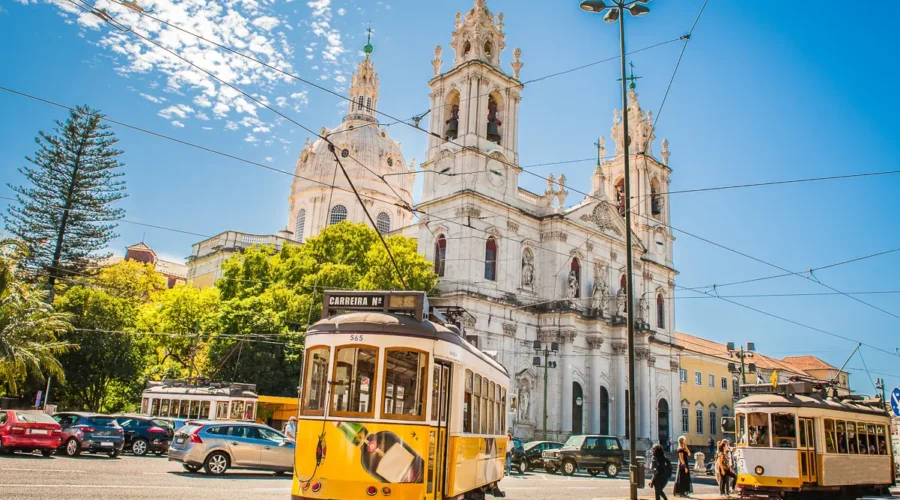 Yellow tram 28 on streets of Lisbon, Portugal